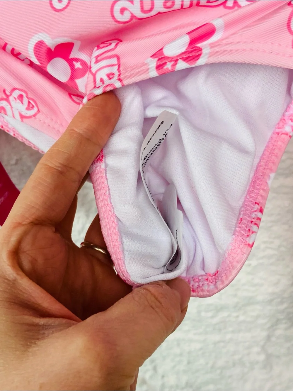 NWT Barbie Pink Floral Logo Long-Sleeve upf 50+ bikini size 3T